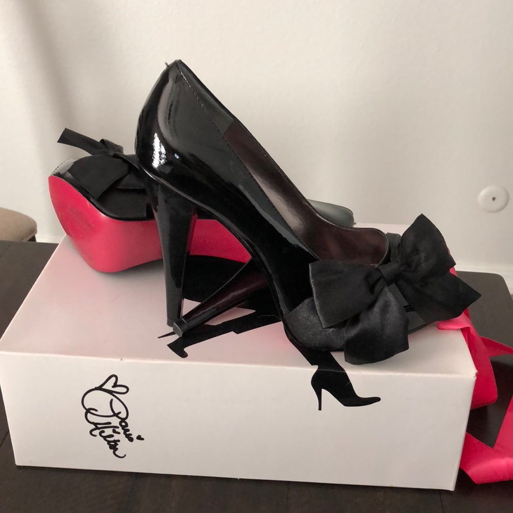 Paris Hilton peep toe bow pumps